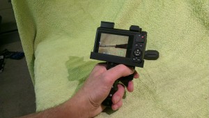 Assembled and held in the left hand as it will be used. This photo shows the location of the shutter trigger and the zoom wheel