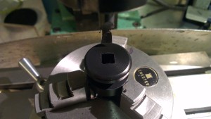 The zoom roting wheel needed a square hole cutting into it for positive location onto the zoom fork. Deep knurls were machined into the wheel